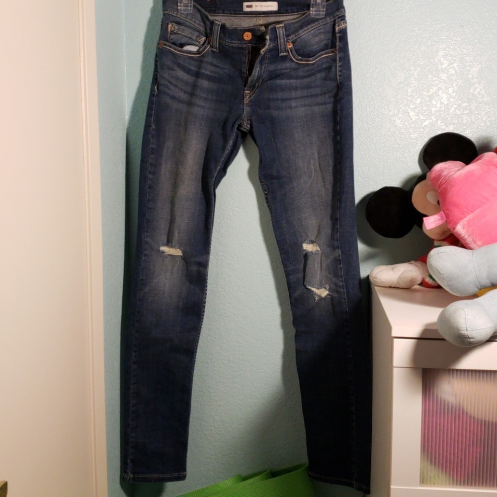 Ripped denim jeans by Levi's